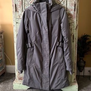 Lululemon Apres it All jacket with zip pockets, adjustable belt and hood.